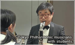 Tokyo Philharmonic musicians with students.